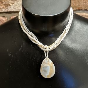 Shell pendant with beaded necklace
